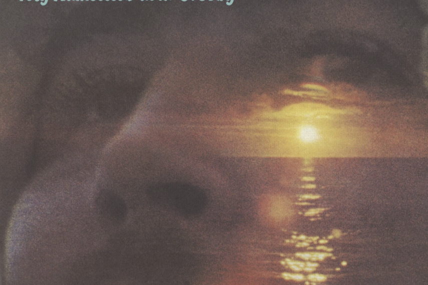 Auf dem Albumcover "If I Could Only Remember My Name" von David Crosby sieht man eine Nahaufnahme eines Gesichts. Drüber gelegt ist ein Sonnenuntergang über dem Meer.