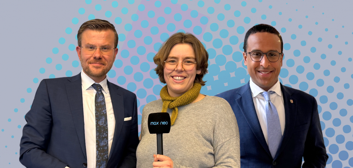 Das Foto zeigt den Oberbürgermeister Marcus König mit Moderatorin Lena Schnelle und den Oberbürgermeisterkandidaten Dr. Nasser Ahmed.